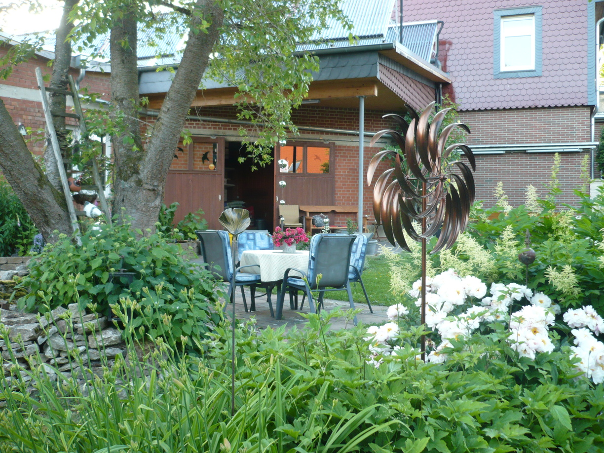 Gartentisch mit St&uuml;hlen mit Auflagen